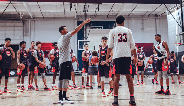 Steph Curry mentoring youth basketball players at SC30 Select Camp
